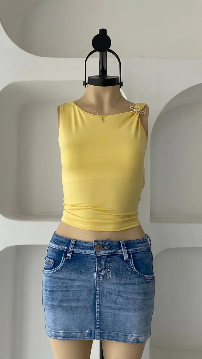 Top broche lazo